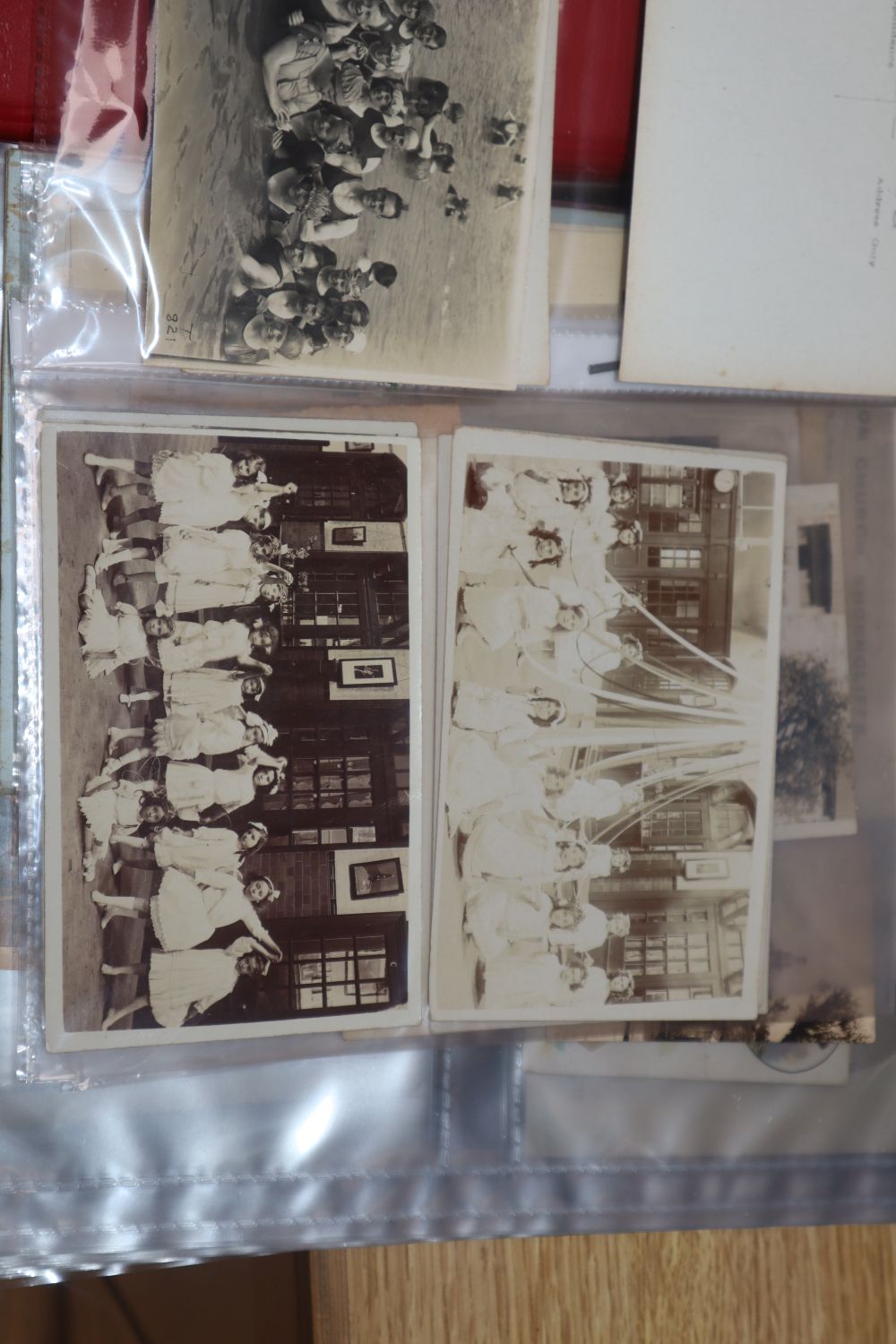 A collection of ephemera to include postcards, valentine and greetings cards, cigarette silks and cards tins, etc.